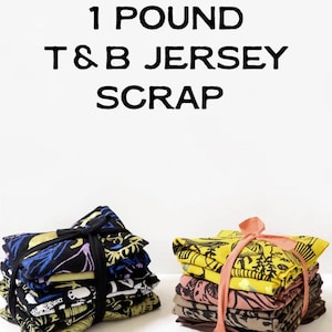 May include: Two bundles of T&B jersey fabric scraps, each weighing approximately 454 grams. One bundle is tied with black ribbon, the other with pink ribbon. The fabric scraps feature various colorful patterns.