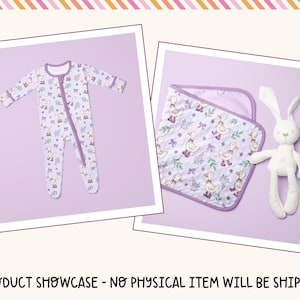 The image is a product showcase featuring a baby onesie with a bunny pattern and a bib with a bunny pattern, both displayed against a purple background.