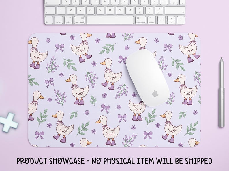 a mouse pad with a pattern of ducks wearing purple bows, a keyboard, and a pen on a pink background.