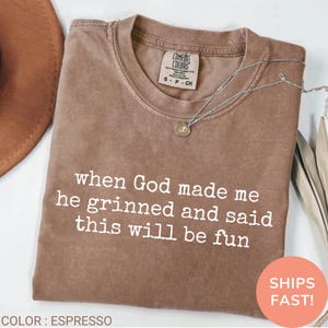 faith walk shirt, custom funny faith shirt, jesus and jokes shirt, christian retreat tee, motivational faith shirt, fun gospel shirt, funny comfort colors tee, church retreat shirt, holy and hilarious tee, prayer and personality shirt, unashamed christian shirt, godly humor tee, spiritual sass graphic tee, fun shirt for faith girl, trendy scripture shirt, quote tee about god, spiritual woman tee, comfort colors gospel tee, prayer warrior humor shirt, christian gift idea, godly woman shirt