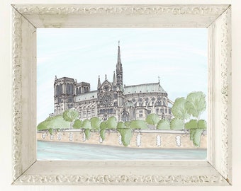 May include: A framed watercolour illustration of Notre Dame Cathedral in Paris, France. The cathedral is depicted in shades of grey and white, with green trees and a blue sky in the background.