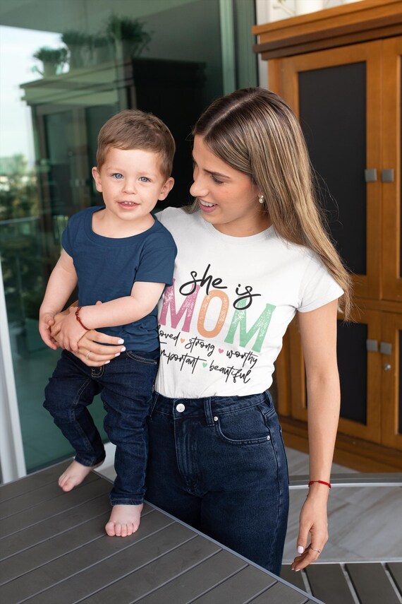 She is Mom T-Shirt, Perfect Gift for Moms, Mother's Day, Casual Wear, Family Gatherings, Love and Strength