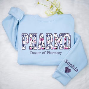 #PharmD #PharmacySweatshirt #DoctorOfPharmacy #PharmacyLife #PharmacistGift #PharmacySchool #PharmacyApparel #PharmacistLife #PharmacyCrewneck #HealthcareApparel #PharmacyStudent #PharmacyGraduation #MedicalSchoolGift #PharmDLife #PharmacyHoodie