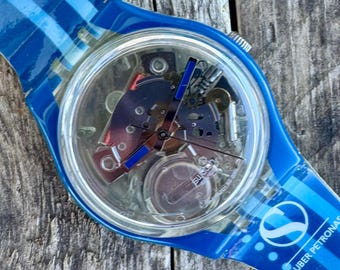 Orologio Swatch vintage: Mass Class GK337 mai indossato, cassa scheletrata trasparente.