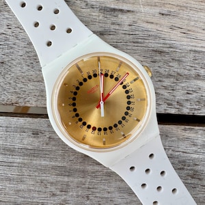 Swiss Swatch Generation 31 Watch (SUOW400) - Big Golden Dial - perfect unworn condition