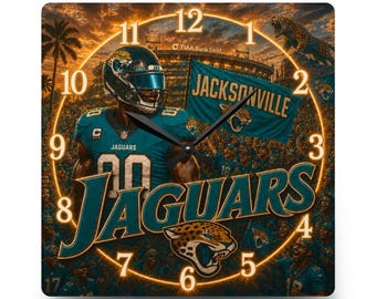 May include: A square wall clock featuring a Jacksonville Jaguars football player in a teal uniform, a stadium background with a flag labelled JACKSONVILLE, the team logo, and the word JAGUARS in large teal letters, all set against a sunset sky.