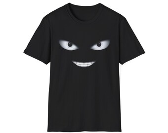 May include: Black t-shirt featuring a white, smiling face graphic. The face has two large eyes and a wide, toothy grin.