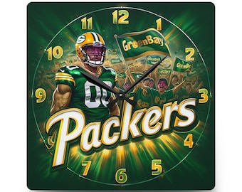 May include: A square wall clock featuring a Green Bay Packers football player in a green and gold uniform, a crowd of fans, and a flag with the text GreenBay. The word Packers is printed in large white and gold letters with black clock hands.