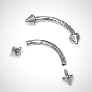 Titanium Spike Eyebrow Piercing: Internally Threaded Curved Barbell