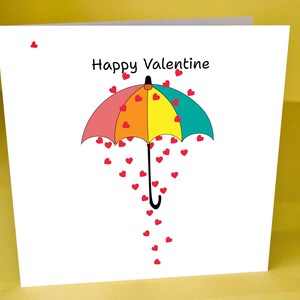 Parapluie coloré avec pluie de coeurs pour la Saint-Valentin - Imprimez une carte A4 (pliée en deux) ou 13 cm x 13,5 cm (à découper) ou envoyez-la à l'imprimante