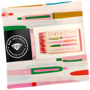 May include: A fabric charm pack featuring a white backdrop with a repeating pattern of colourful pens. The pack includes a label with the text "TR*NKETRY by MELODY MILLER" and a Ruby Star Society logo. The pack is 12.7 cm.