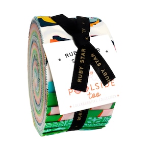 May include: Rolled fabric bundle with a variety of colorful patterns, including green, pink, and blue. The bundle is tied with a black ribbon and a tag that reads "Ruby Star Poolsides too". The fabric is likely for quilting or other sewing projects.