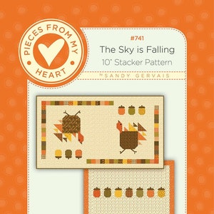 Peut inclure: Un modèle de courtepointe pour un motif Stacker de 25,4 cm appelé "The Sky is Falling" par Sandy Gervais. Le motif représente une dinde avec des glands et une palette de couleurs brun, orange et jaune.