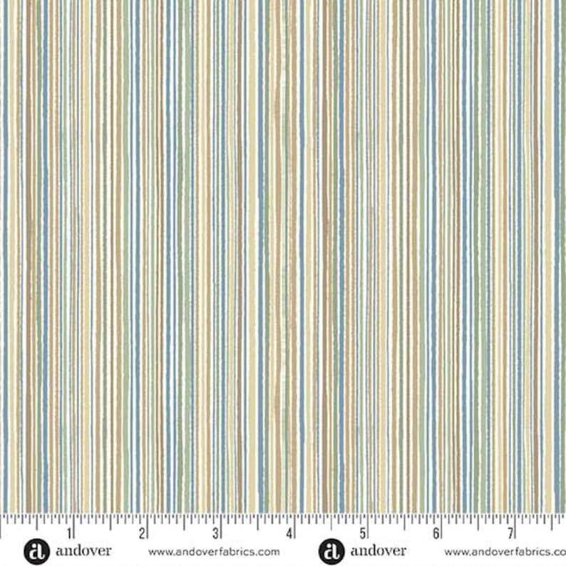May include: Fabric with vertical stripes in shades of beige, blue, and green. The stripes are of varying widths and are evenly spaced across the fabric. The fabric has a textured appearance and is suitable for various sewing projects.