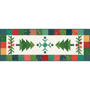 May include: A green and white table runner with a geometric pattern of trees and snowflakes. The runner has a red, green, and white border.