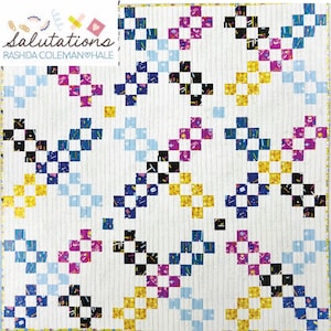 May include: A white quilt with a repeating pattern of colorful squares in blue, black, yellow, and purple. The quilt features the text "salutations" and "Rashida Coleman Hale".
