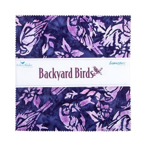 May include: A stack of fabric squares with a repeating pattern of birds and floral elements in shades of purple and white on a dark blue background. The label reads "Backyard Birds" with the Riley Blake Designs logo.