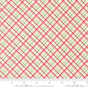 May include: Cream-coloured fabric featuring a plaid pattern in red, pink, and green. Diagonal lines form a grid design. A ruler is along the bottom edge, with the word "moda" printed on it. Ideal for quilting or crafting.