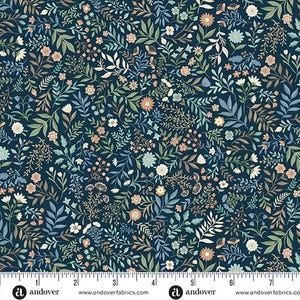 May include: A fabric with a dense floral pattern. The design features a dark blue background with an all-over print of various flowers, leaves, and vines in shades of white, peach, green, and blue. The fabric is marked with a ruler along the bottom edge.
