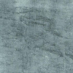May include: A close-up of a textured, blue fabric with a subtle pattern. The fabric has a slightly faded appearance, giving it a vintage feel.