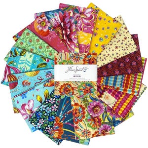 May include: A collection of square fabric swatches arranged in a circular fan pattern. The fabric pieces feature various colourful floral, geometric, and abstract prints in shades of pink, yellow, blue, and green. A white paper band with the text FreeSpirit is wrapped around the centre of the stack.