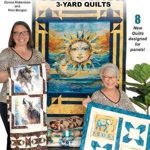 以下が含まれることがあります： 画像は、「Panel Perfect 3-Yard Quilts」というタイトルの本で、著者の名前が記載されています。2人の女性がオオカミとゾウのデザインのキルトを持っています。本の表紙には太陽と月のデザインが描かれています。テキストには「8 New Quilts designed for panels!」と書かれています。
