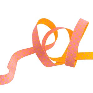 May include: A pink ribbon with yellow polka dots is curled and twisted. The ribbon is a soft, textured fabric.