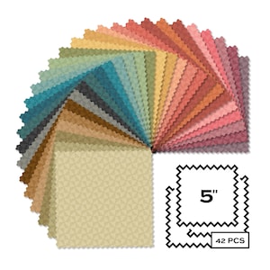 May include: A collection of 42 fabric squares, each 5 inches, arranged in a circular pattern. The squares display a variety of colors, including shades of blue, green, brown, and pink. The edges of the fabric are cut with a zig-zag pattern.