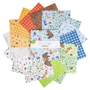 May include: A stack of square fabric swatches arranged in a starburst pattern. The fabric features various prints including bears, foxes, deer, and forest elements in blue, green, yellow, and orange. A central paper band reads Colorful critters.