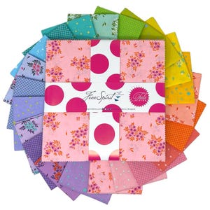 May include: A collection of fabric squares arranged in a circular pattern, showcasing a variety of colors and patterns. The central package features large pink polka dots and the text "Free Spirit" and "Tula Pink". The fabrics include floral and geometric designs.