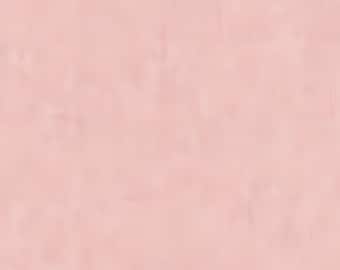 May include: A solid, uniform field of light pastel pink color. The surface displays a subtle, soft-focus texture with slight variations in tone, creating a smooth and consistent appearance across the entire square frame without any distinct patterns.
