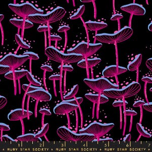 May include: A black fabric featuring a repeating pattern of neon pink mushrooms with light blue edges and gills. The mushrooms vary in size and orientation across the surface. A ruler at the bottom shows 18 cm and reads Ruby Star Society.