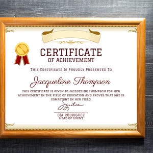 May include: A framed certificate of achievement with a gold seal and red ribbon. The certificate is presented to Jacqueline Thompson for her achievement in the field of education. The signature is from CIA Rodriguez, Head of Event.