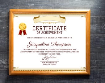 May include: A framed certificate of achievement with a gold seal and red ribbon. The certificate is presented to Jacqueline Thompson for her achievement in the field of education. The signature is from CIA Rodriguez, Head of Event.