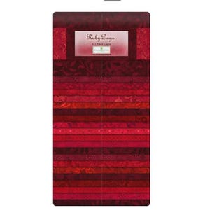 May include: A pack of 42 fabric scraps in various shades of red, from deep burgundy to bright crimson. The fabric scraps are arranged in a stack and feature different patterns, including floral, geometric, and polka dots. The pack is labeled "Ruby Days" and "42 Fabric Scraps".