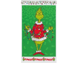 May include: A rectangular Christmas-themed design featuring the Grinch in a red sweater adorned with colorful lights. The background is green with the word "HO" repeated. The top and bottom borders have Christmas lights and Grinch characters.