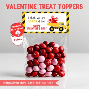 May include: Printable Valentine's Day treat toppers featuring a yellow dump truck with red hearts. The text reads "I think you are LOADS of fun! Happy Valentine's Day!" The toppers are available in four sizes: 6.5x5, 5x5, 4x4, and 3x3 inches.