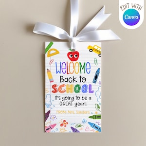 May include: A rectangular tag with a white ribbon, featuring the text "WELCOME Back to SCHOOL" in colorful letters. The tag includes illustrations of school supplies like a pencil, crayon, and apple. The phrase "It's going to be a GREAT year!" is also present.