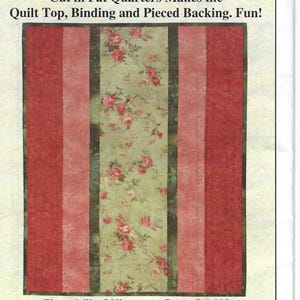 May include: A quilt top with a floral center panel and red and pink striped side panels. The text "Four Prints Plus One Background Fabric" and "Size: 16"x 20"" are visible. The quilt is designed for quilting projects.