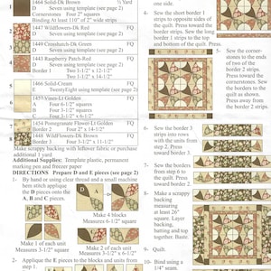 Puede incluir: Un patrón de acolchado para una colcha cuadrada de 59,7 cm llamada "Emilie's Winding Ways". El patrón incluye instrucciones para hacer los bloques de la colcha, los bordes y el encuadernado. La colcha presenta un esquema de color marrón, verde, rojo y crema.
