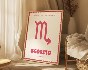 May include: A white framed poster with a pink Scorpio zodiac sign and the text "OCTOBER 23 - NOVEMBER 21" and "SCORPIO PASSIONATE".