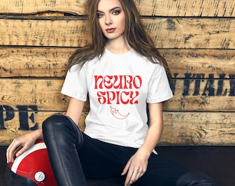 May include: White t-shirt with red text that says "Neuro Spicy" and a red chilli pepper graphic.