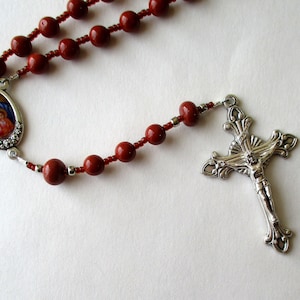 Catholic Rosary of Red Jasper with Holy Family Centerpiece and Traditional Crucifix