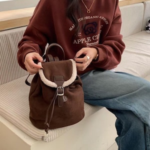 Backpack purse with camel leather trim Cooper Pebbled Leather and Signature Logo Backpack in BLACK  main image 3