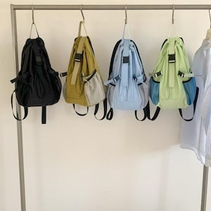Lightweight Nylon Backpack, Everyday Travel Backpack, Casual Drawstring Daypack, Water Bottle Pocket Backpack, Minimalist Bag