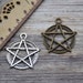 see more listings in the metal charms,pendants section