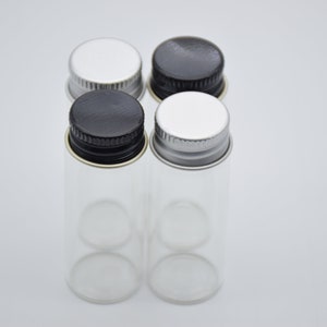 2 bottiglie di vetro trasparente con tappo di metallo, fiale di vetro da 10 ml con tappi, barattoli di vetro trasparente con coperchi, contenitori vuoti per barattoli di fiale, 22x50mm