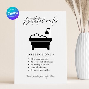May include: A white sign with the text "Bathtub rules" and an illustration of a bathtub. The sign includes instructions: Fill to a safe level only, do not use bath oils or dyes, no standing in the tub, rinse tub after use, and keep area clean and dry.