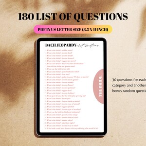 May include: A digital screen displaying a list of 180 questions for a hen party game called "Bach Jeopardy". The questions are in a list format and cover various topics about the bride. The screen is on a light brown surface. The text "THE BRIDE" is in a pink circle on the right side of the screen.