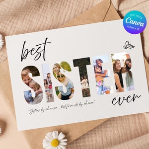 May include: A white card with the words "best sister ever" in black script. The letters of "sister" are filled with photos of people. The card is on a beige surface with daisies and an envelope.